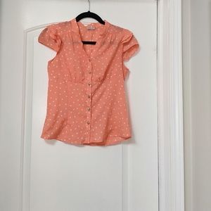 Cute Peach color blouse with white polka dots